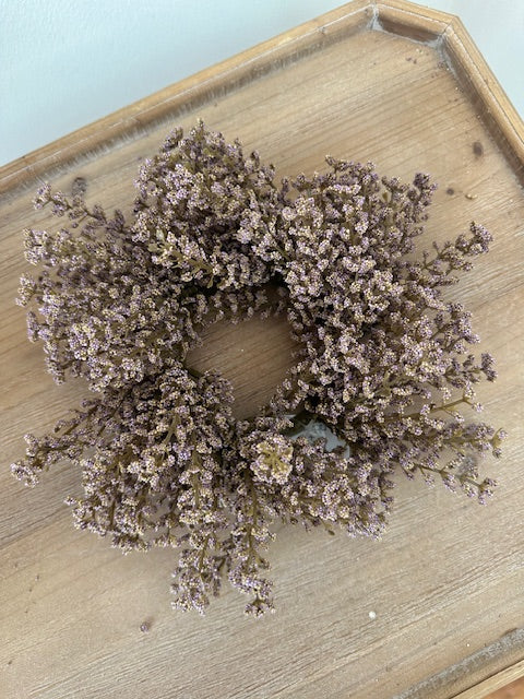 Dried lavender wreath on a wooden surface