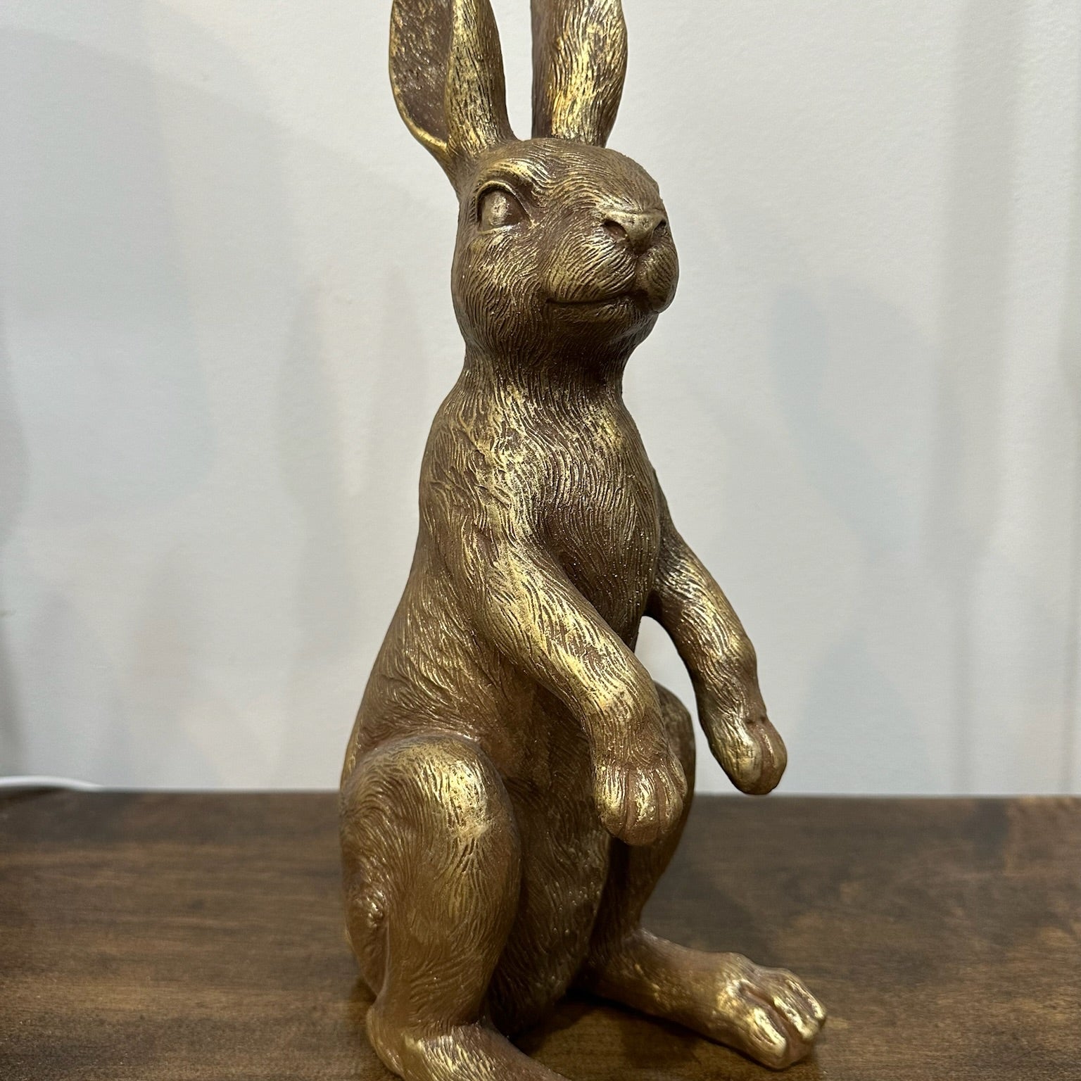 brass rabbit sitting up