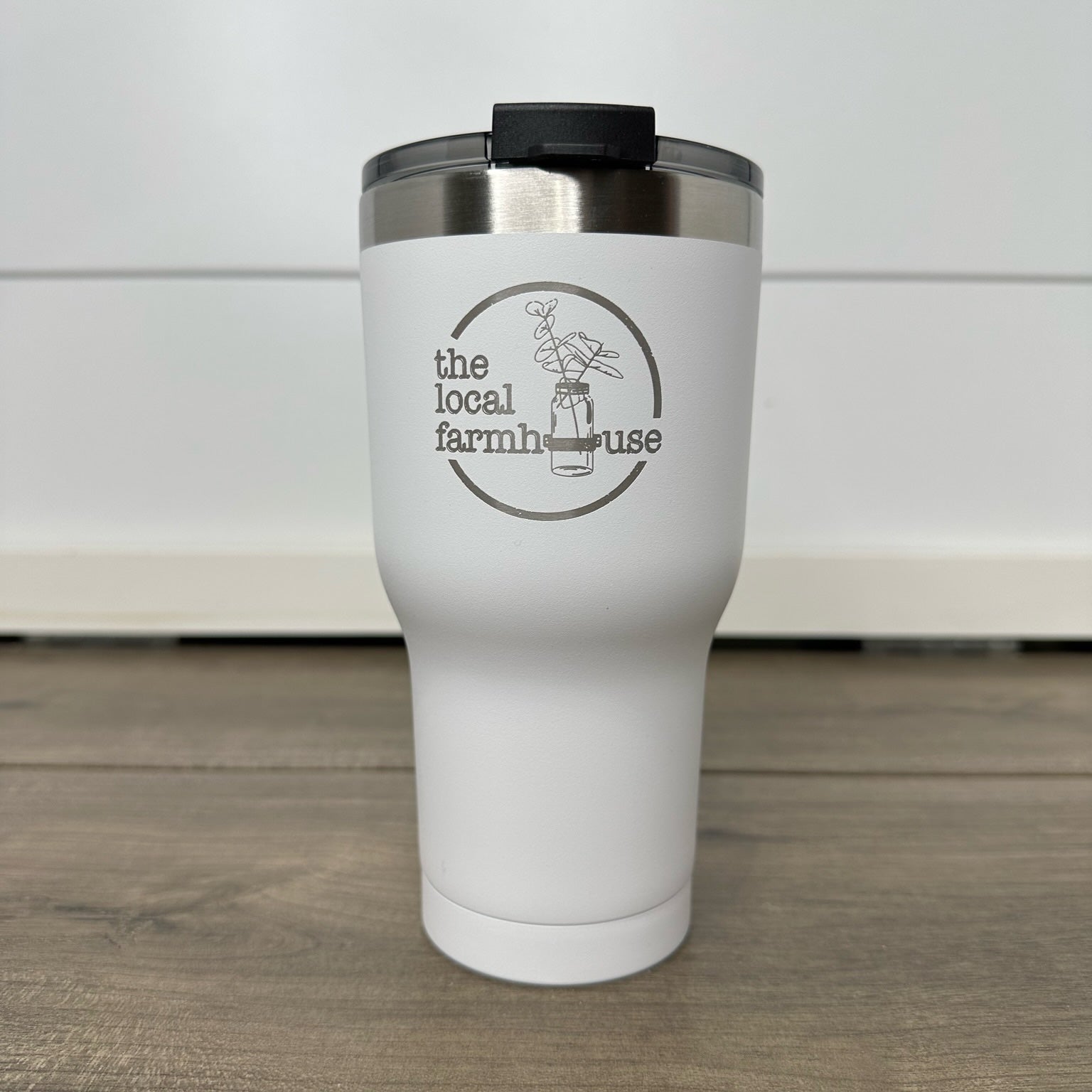 A white 20oz tumbler with 'The Local Farmhouse' logo printed on the side.