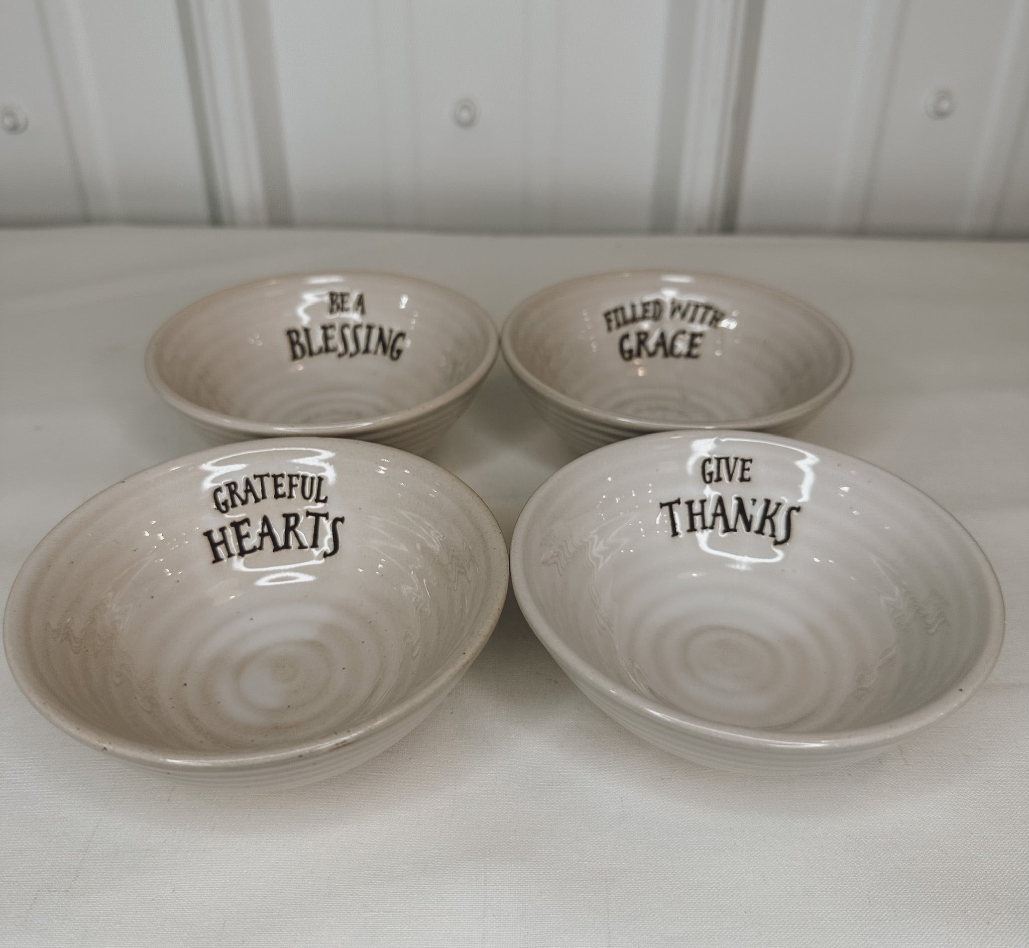 small ceramic dishes with blessings